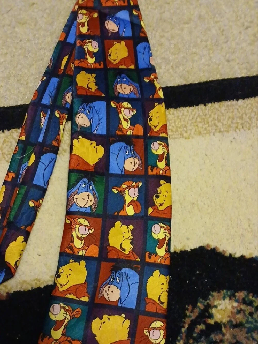 Disney Winnie the Pooh Character Grid Tie in Blue, Yellow, Red, Green